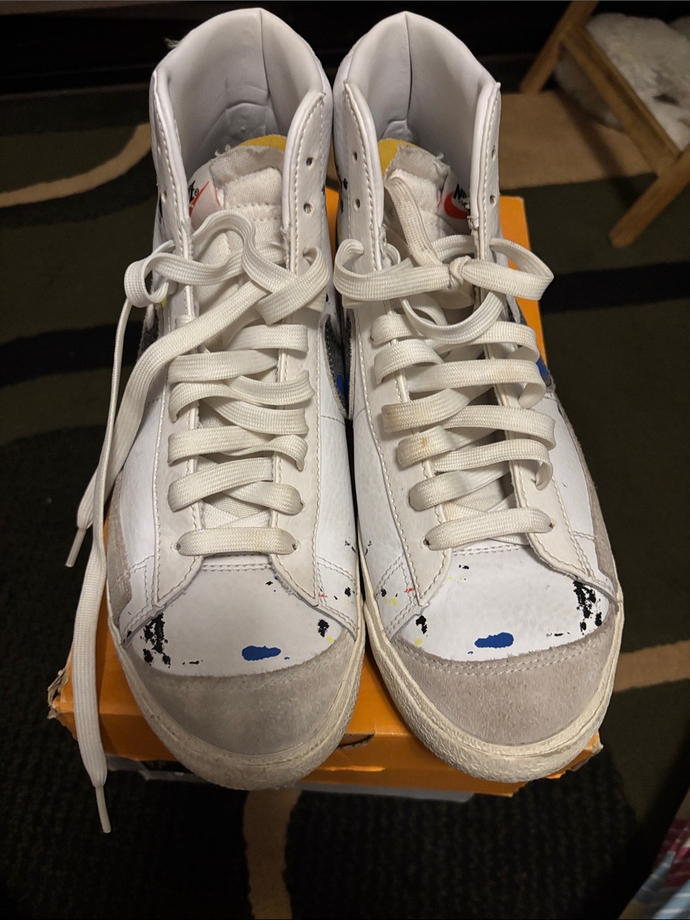 Nike White High-Top Sneakers with Blue and Yellow Accents